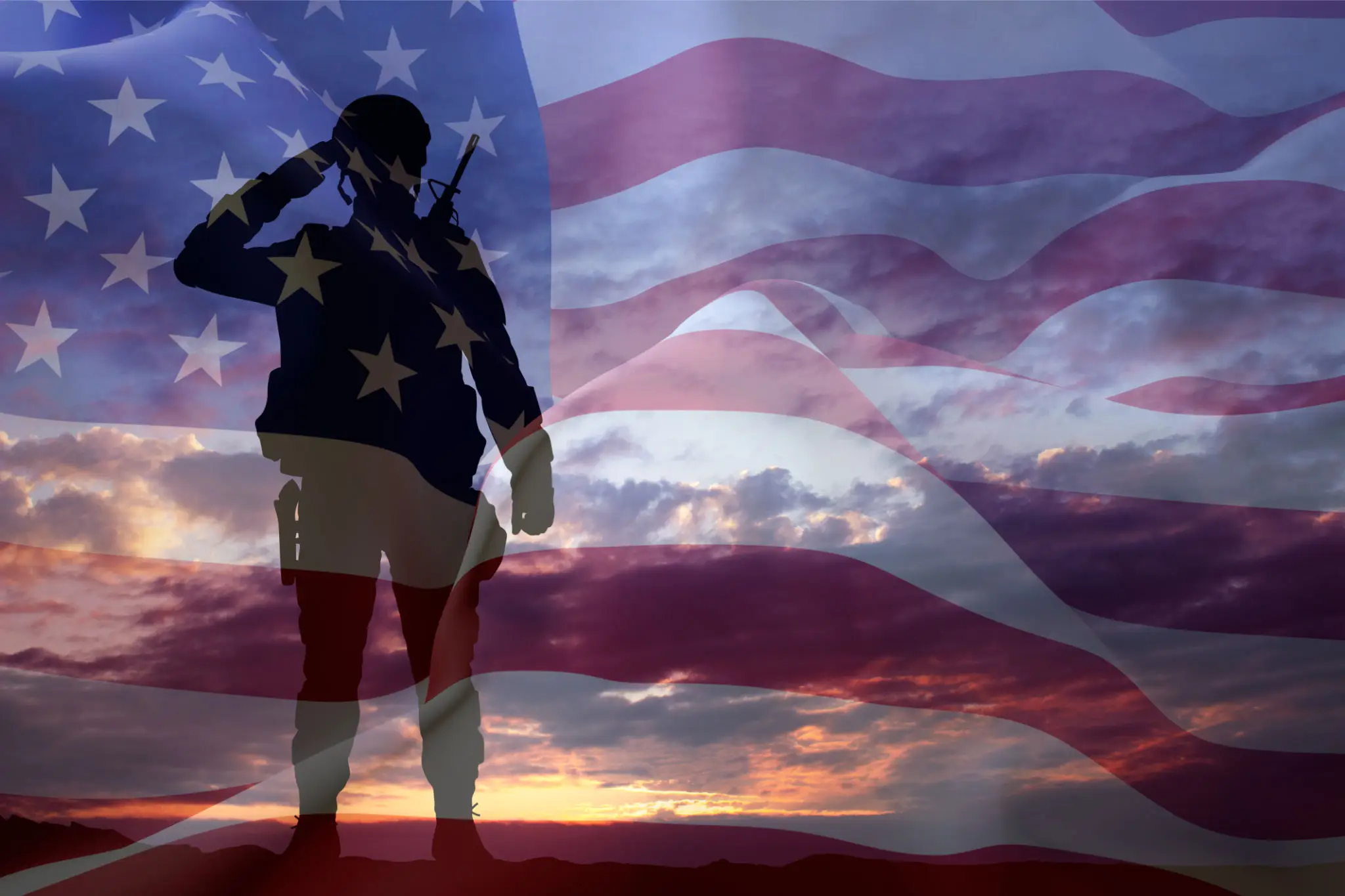 Silhouette of a soldier with an American flag overlay at sunset.